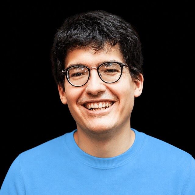 AI-generated portrait of Daniel Levy wearing a DoomBench-blue top against a black background.